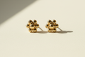 14k yellow gold granulated flower stud earrings with round beaded petals
