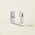 Silver rectangular post earrings with stacked vertical bar design