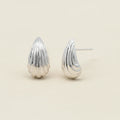 Textured teardrop stud earrings, silver-tone with ridged shell design