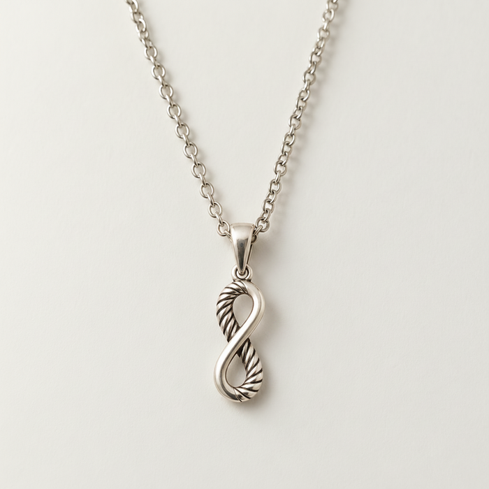 Silver infinity heart pendant necklace with textured twist, cable chain