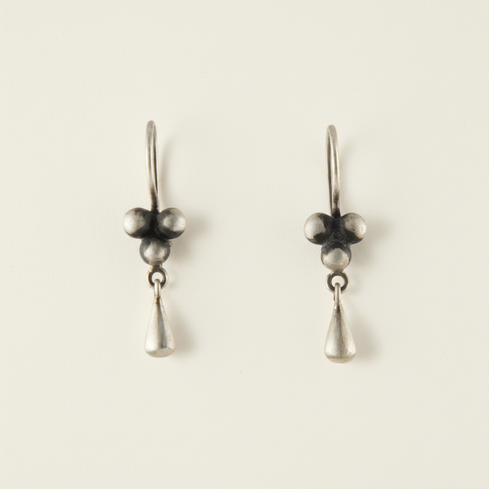 Ball cluster drop earrings with three dark bead spheres and teardrop dangles