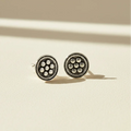 Silver-tone beaded circle stud earrings with six pearl-like dot accents