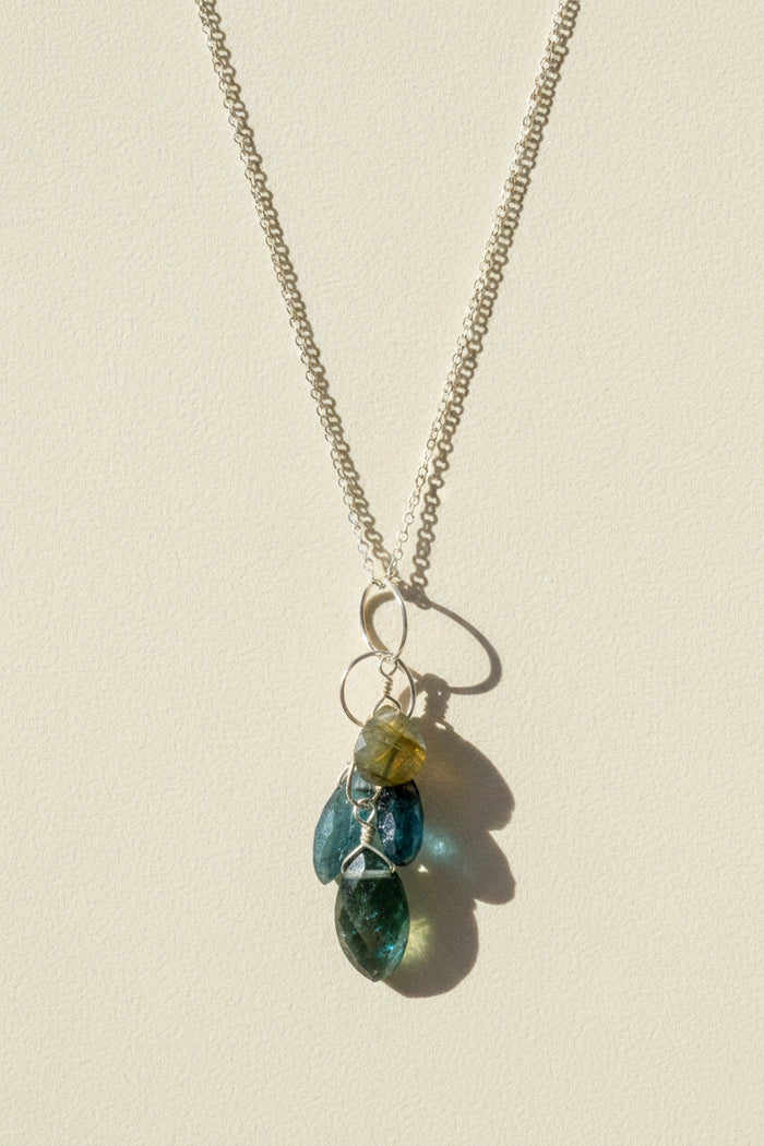 Silver chain necklace with teardrop green-blue gemstone cluster pendant