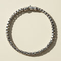 Silver-tone box and byzantine chain bracelet with interlocking rectangular and twisted links