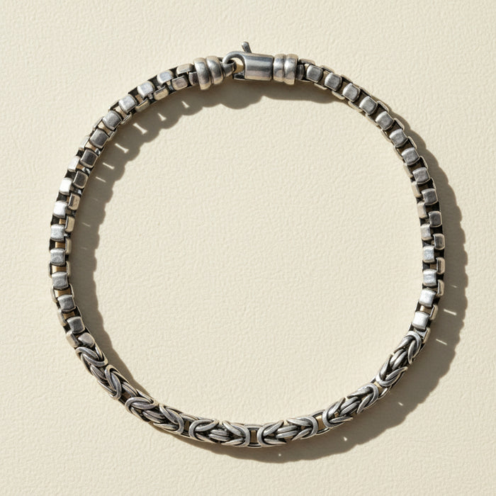 Silver-tone box and byzantine chain bracelet with interlocking rectangular and twisted links