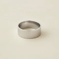 Wide silver-tone cigar band ring with smooth, flat top