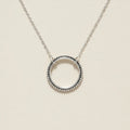 Silver circle pendant necklace with dotted round halo and link chain