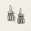 Silver-tone dangle earrings with clear baguette quartz rectangles and dangling tiers