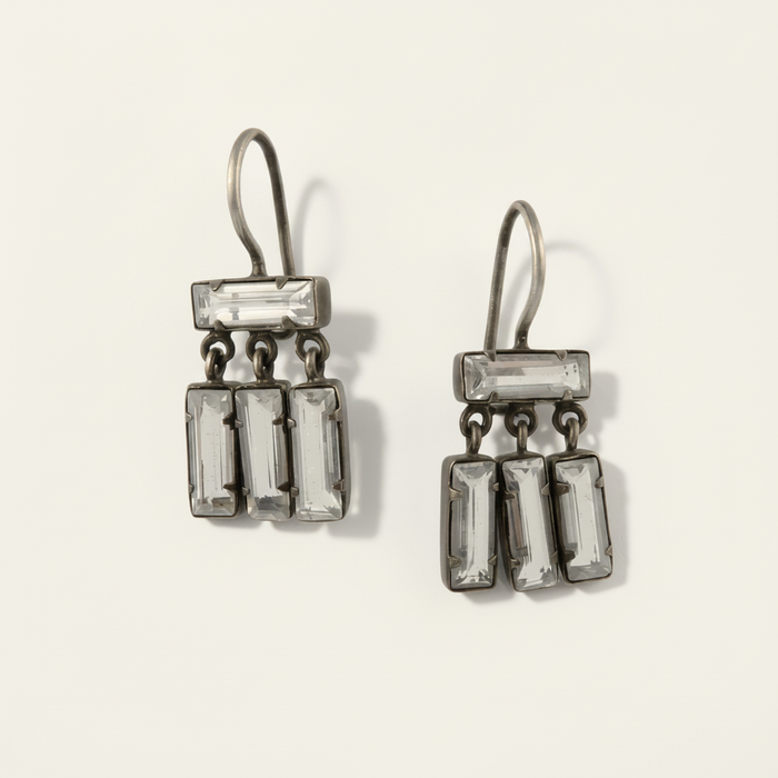Silver-tone dangle earrings with clear baguette quartz rectangles and dangling tiers