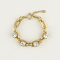 Gold-tone crystal link bracelet with five round clear stones