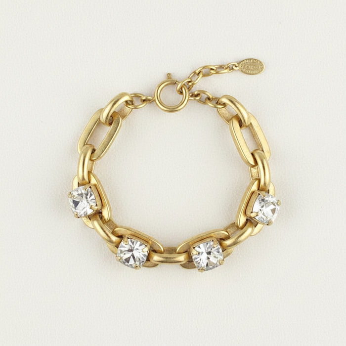 Gold-tone crystal link bracelet with five round clear stones