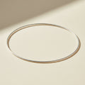 Thin silver bangle bracelet, smooth oval cuff