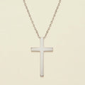 Dainty cross necklace with silver-tone cross pendant on a chain