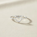 Silver-tone open-heart ring with raised heart front