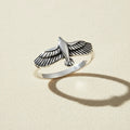 Silver eagle motif ring with raised wings, size 10