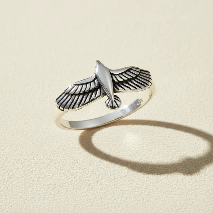 Silver eagle motif ring with raised wings, size 10
