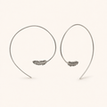 Silver feather pull-through hoop earrings with dangling feather charms