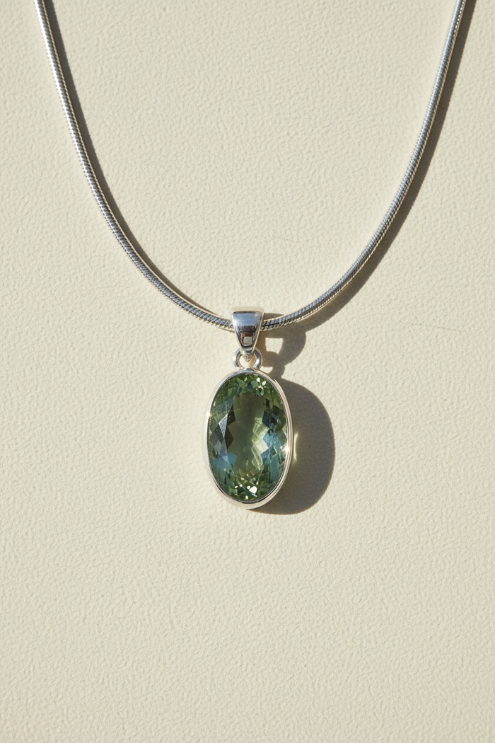 Silver chain pendant necklace with oval green amethyst stone