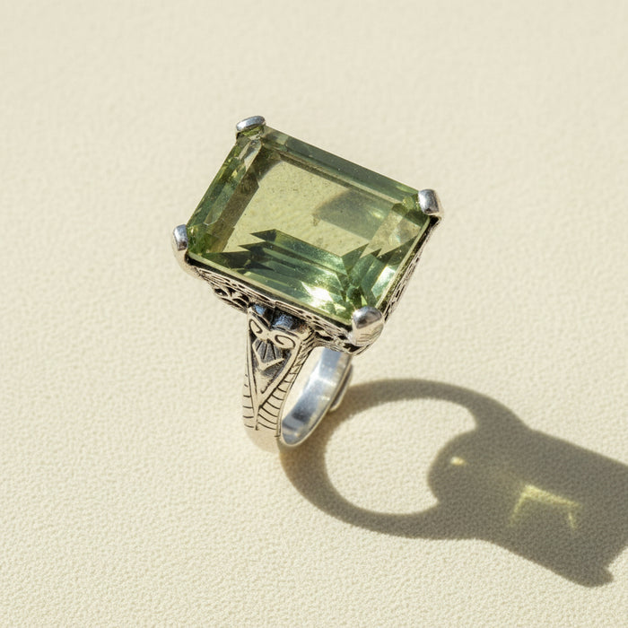 Green amethyst statement ring with square-cut stone and silver filigree setting