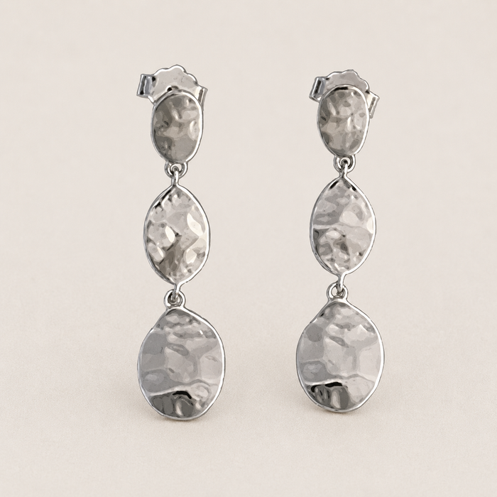 Triple drop post earrings with hammered silver-tone metal teardrops