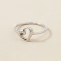 Silver-tone heart infinity ring with open loop band
