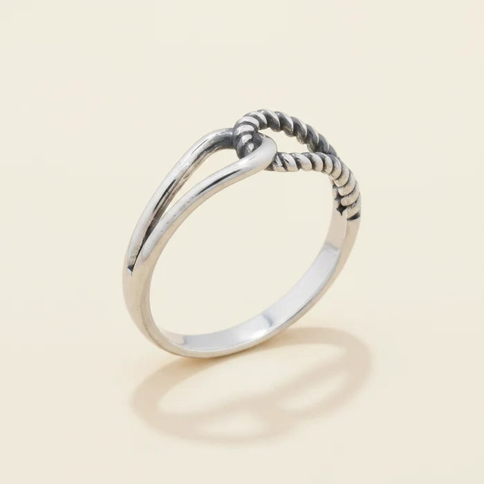 Silver-tone interlocking loops ring with braided loop detail, smooth band