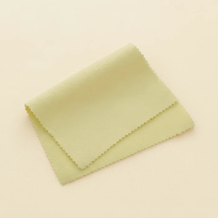 Lemon yellow jewelry polishing cloth, folded rectangle