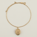 Gold-tone locket necklace with oval pendant and linked chain collar