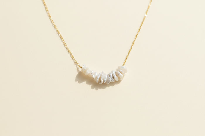 Keishi pearl row necklace with gold chain and white baroque pearls