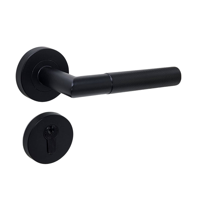 Modern knurled door handle on rose in matt black