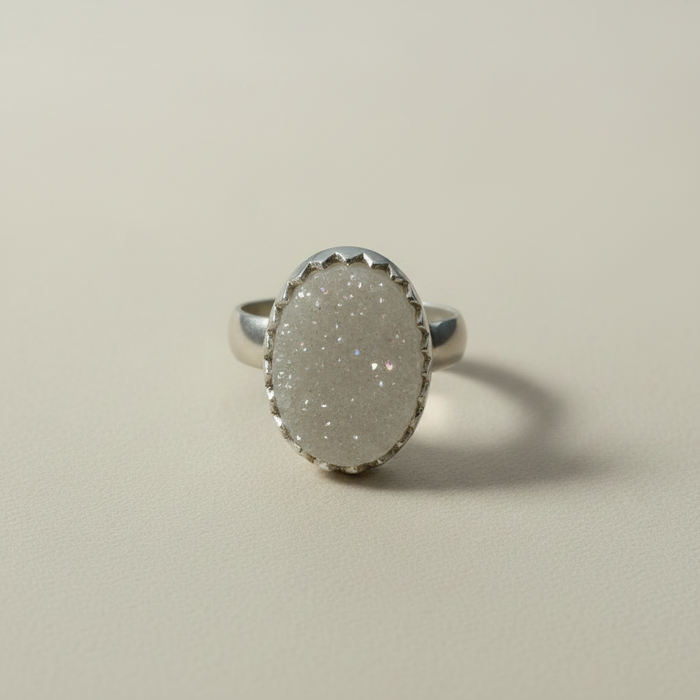 Large oval druzy ring with silver-gray glitter stone and slim silver band