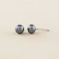 Large gray pearl stud earrings with round pearls and post backs