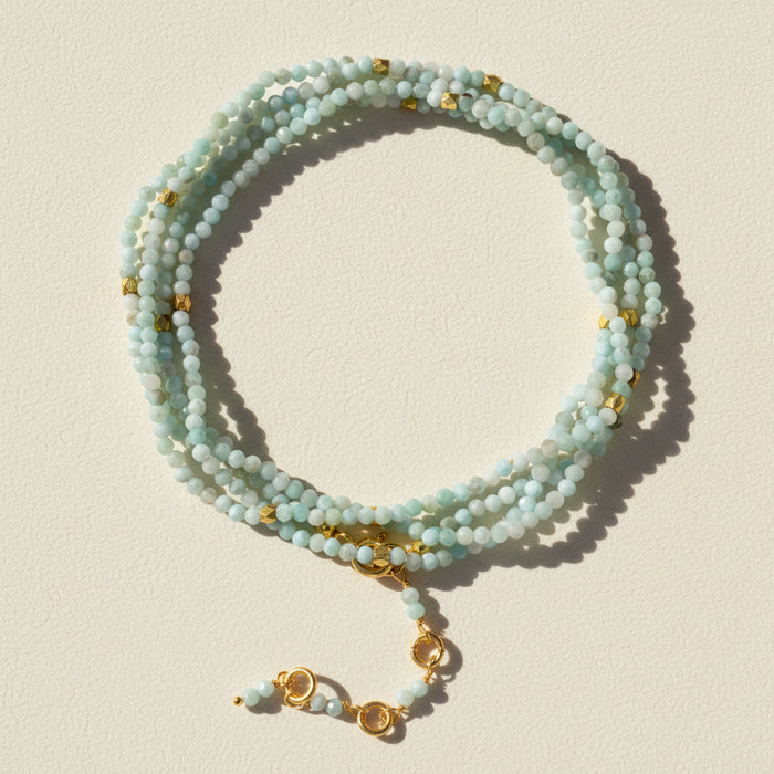Light aqua bead wrap bracelet/necklace with gold charms and clasp