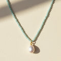 Larimar pearl choker necklace with light blue bead chain and white pearl pendant