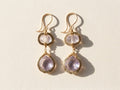 Gold-tone double drop earrings with clear and lilac beaded drops, lever hooks