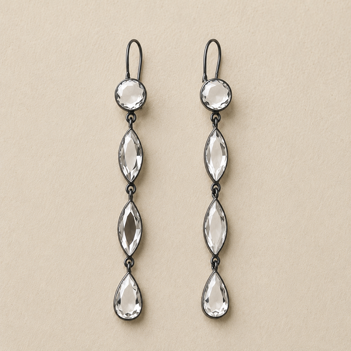 Pair of long mirrored drop earrings with three faceted teardrop charms and silver hooks