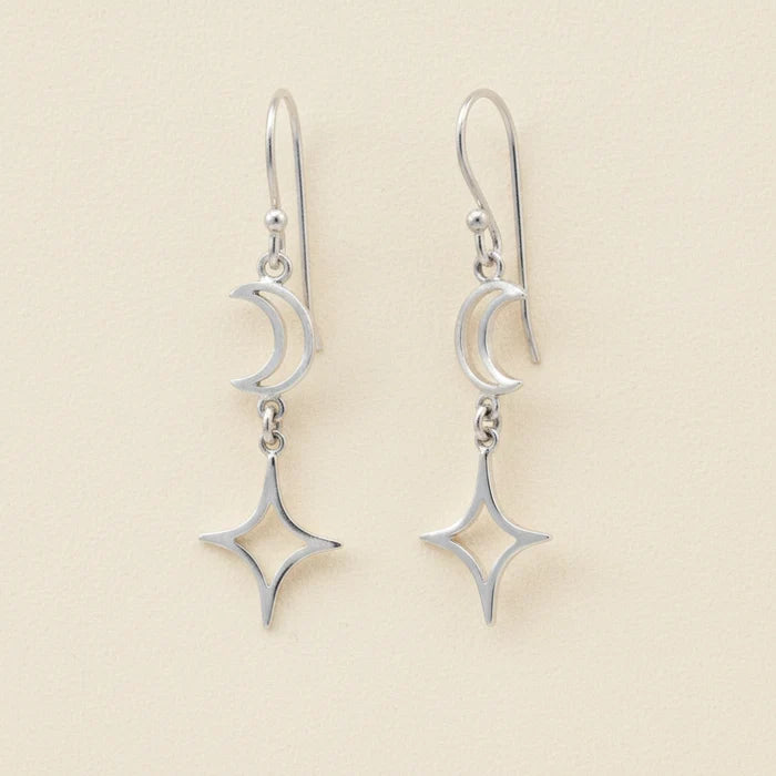 Silver-tone dangle earrings with crescent moon and star charms on linked hooks