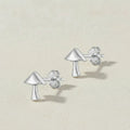 Silver mushroom-shaped stud earrings with butterfly backings