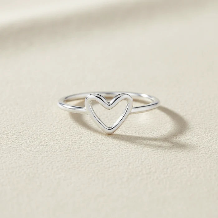 Silver-tone open-heart ring with raised heart front