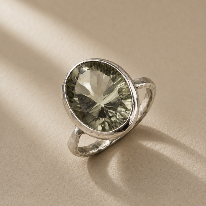 Silver statement ring with oval green amethyst gemstone in bezel setting