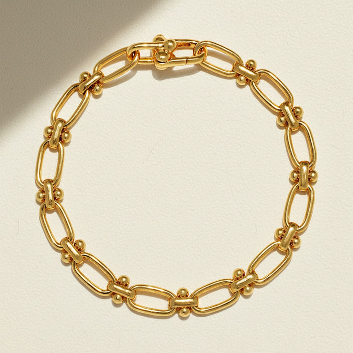 Gold-tone oval link statement bracelet with toggle clasp