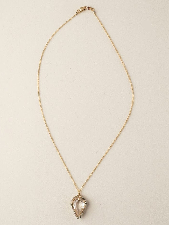 Gold-tone thin chain necklace with small heart teardrop pendant and clear stones