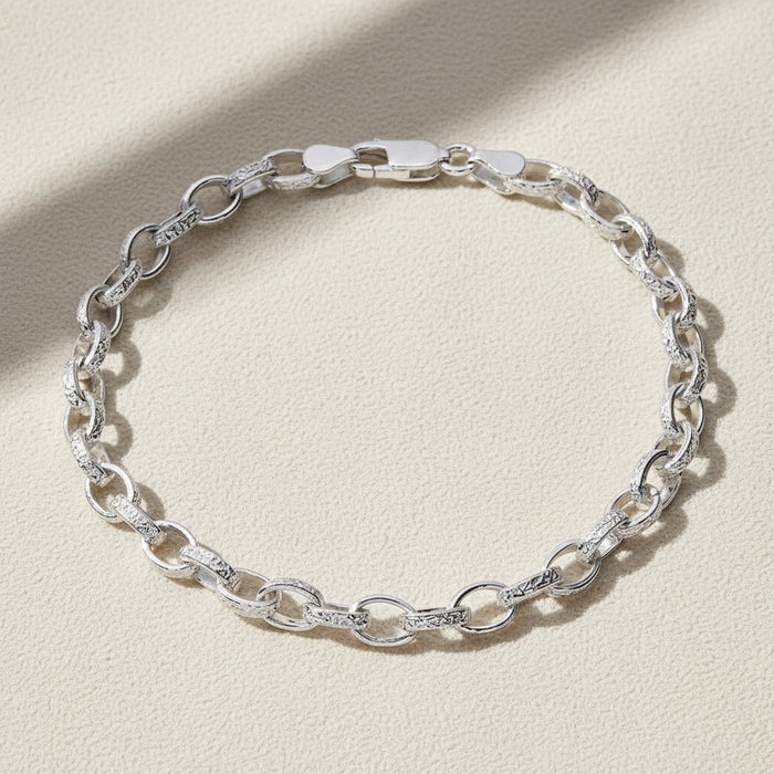 Silver chain bracelet on a white background