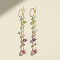 Gold-tone wildflower dangle earrings with multi-color bead and teardrop charms