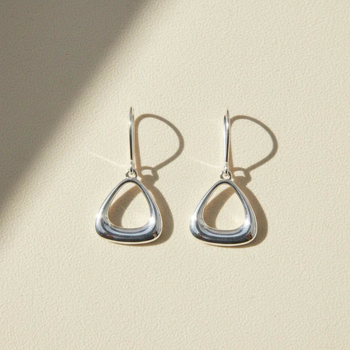 Silver puffy triangle drop earrings with fishhook backs