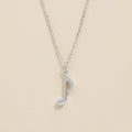 Silver-tone chain necklace with quarter note charm pendant