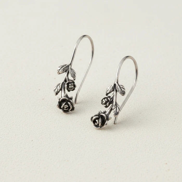 Silver-tone rose drop earrings with dangling rose and leaf charms