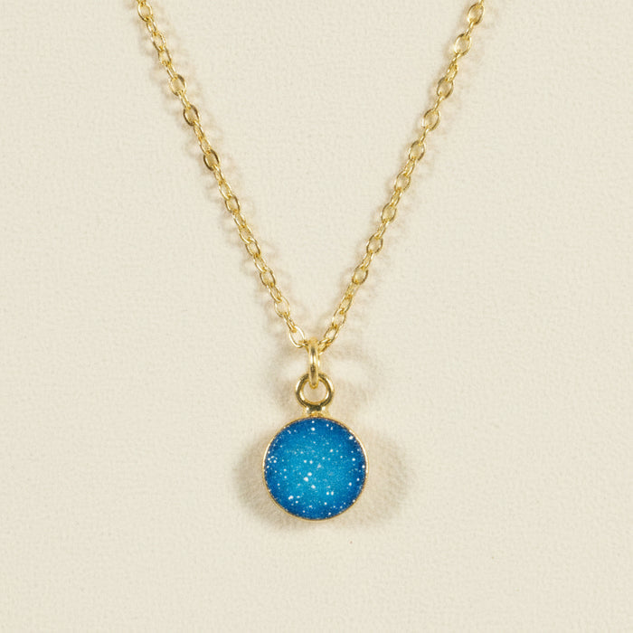 Gold chain druzy pendant necklace with round aqua blue stone