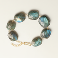 Labradorite stone bracelet with large oval blue-green cabochons and gold links