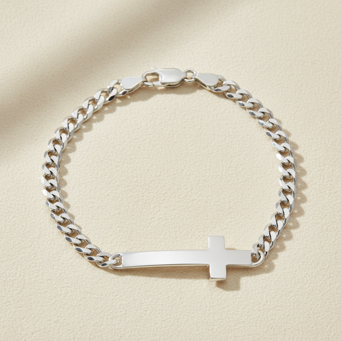 Silver chain bracelet with sideways cross charm and lobster clasp